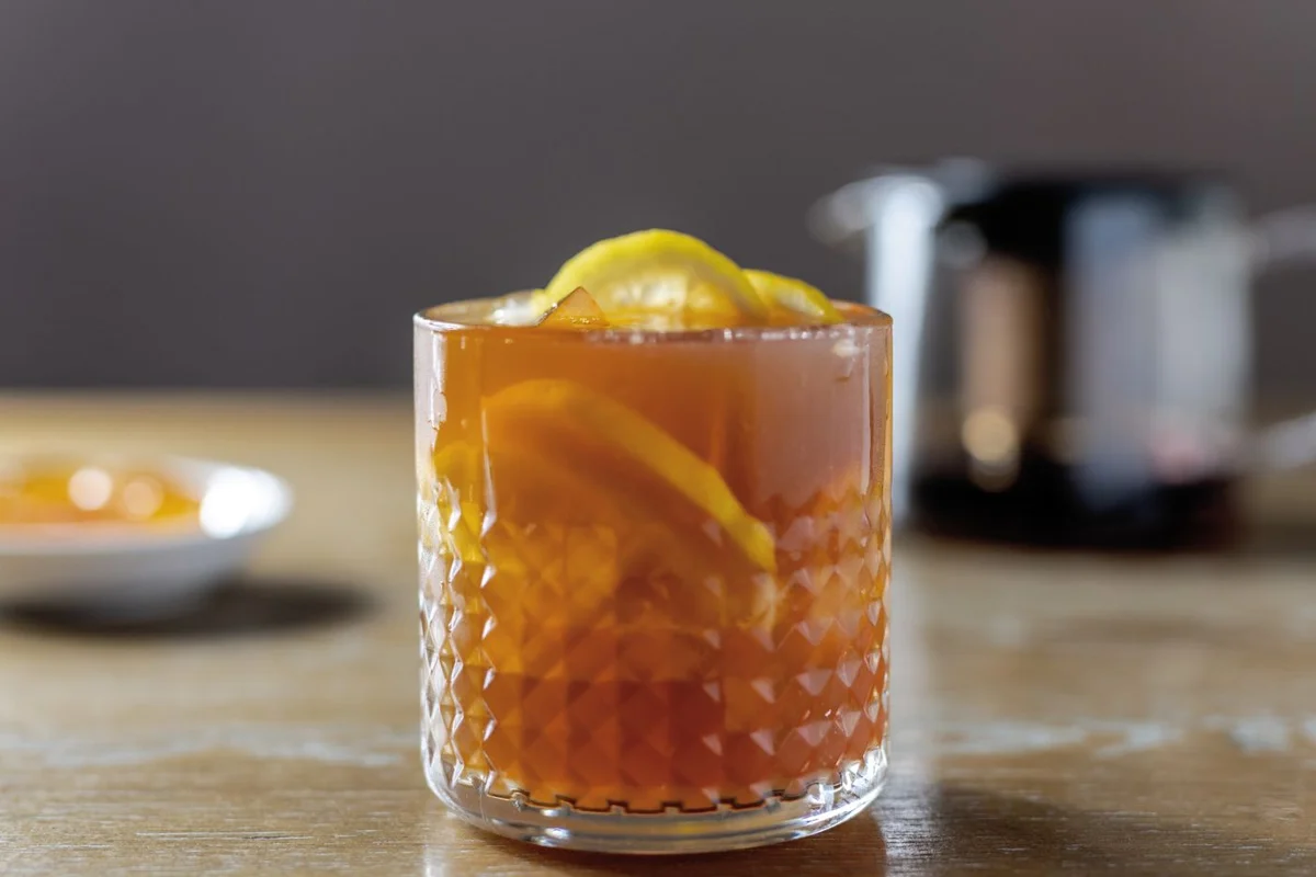 Iced tea with lemon in a textured glass